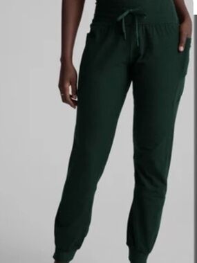 Beyond Yoga Go Pocket Jogger in forest green.